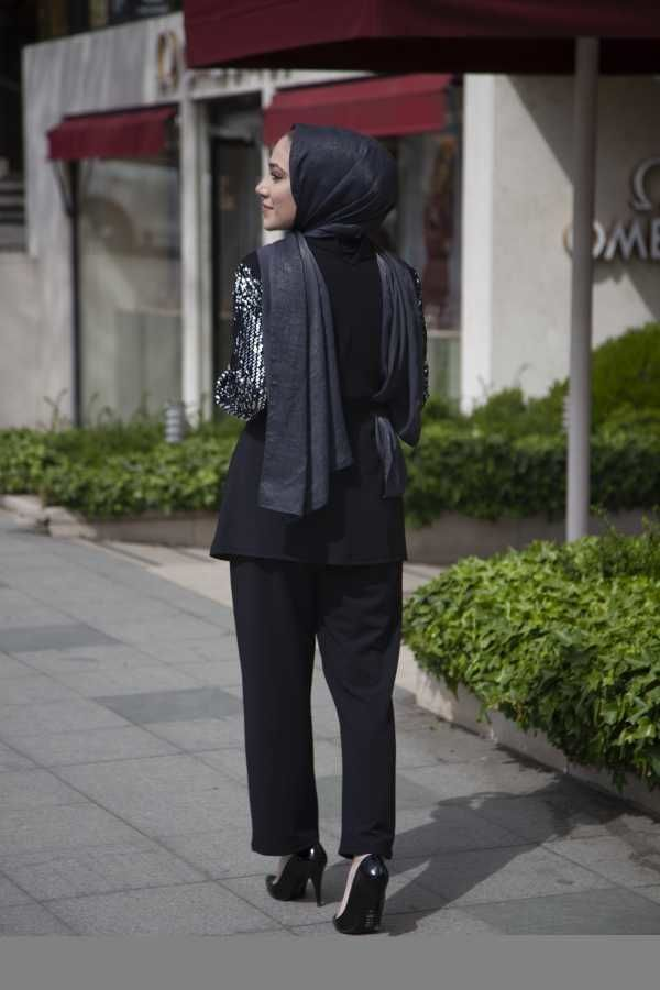 طقم نسائي أسود مع أكمام مزينة تصميم حديث و رائع – صناعة تركية